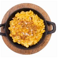 Mac & Cheese · Mac and cheese: a classic blend of Cheddar cheeses, cream, and elbow macaroni. Baked with sh...