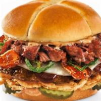 New! Smokehouse Brisket Burger · A fire-grilled beef burger topped with Whiskey River® BBQ Sauce, chopped smoked brisket, bla...