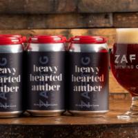 Heavy Hearted Amber · Amber Ale 8% | Sometimes you win at love, sometimes you lose. With each loss there is a heav...