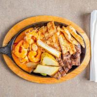 Mini Parrillada Mix · Half grilled steak, chicken and seafood with cheese.