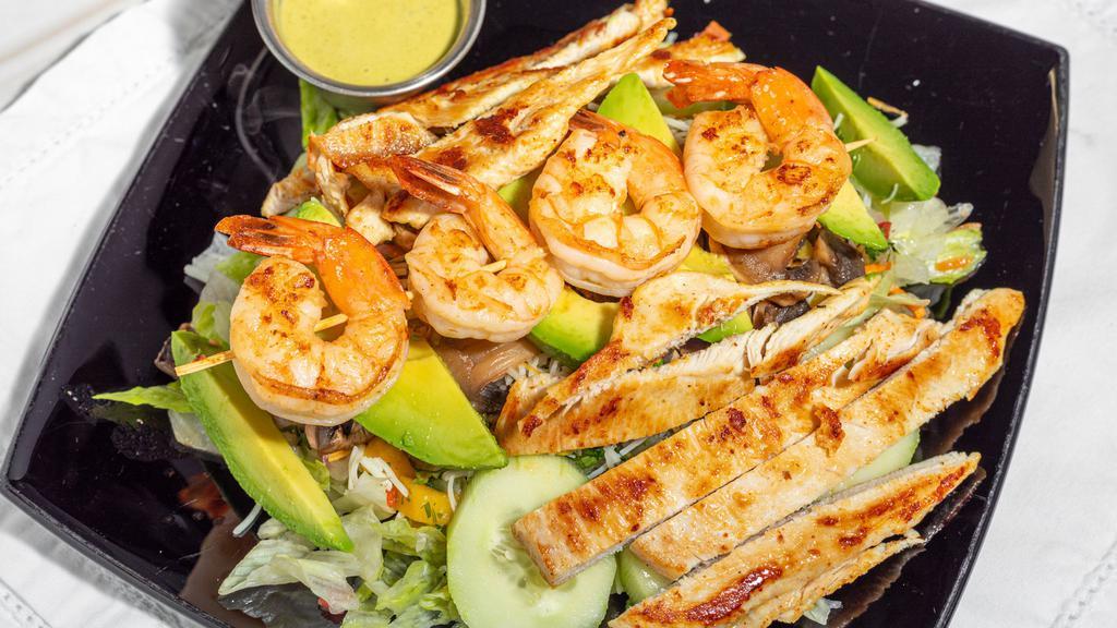 Agave Salad · Gluten-free. Grilled chicken breasts, shrimp and mushrooms over a bed of lettuce, topped with cheese, pico de gallo, cucumbers and sliced avocado.