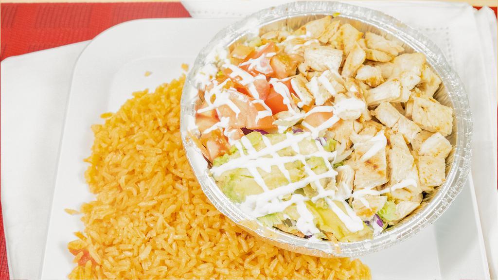Chicken Bowl · Gluten free. Grilled chicken breast with rice, black beans, lettuce, avocado, tomato and sour cream.