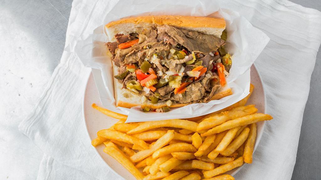 Italian Beef Sandwich · American or Provolone Cheese, Hot, Mild Peppers, Choice of Dip, Light Dip or Well Dip.