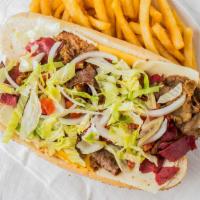 Gym Shoe Sandwich · Italian beef, gyro meat, slice of corned beef, Swiss cheese, lettuce, tomatoes, onions and m...