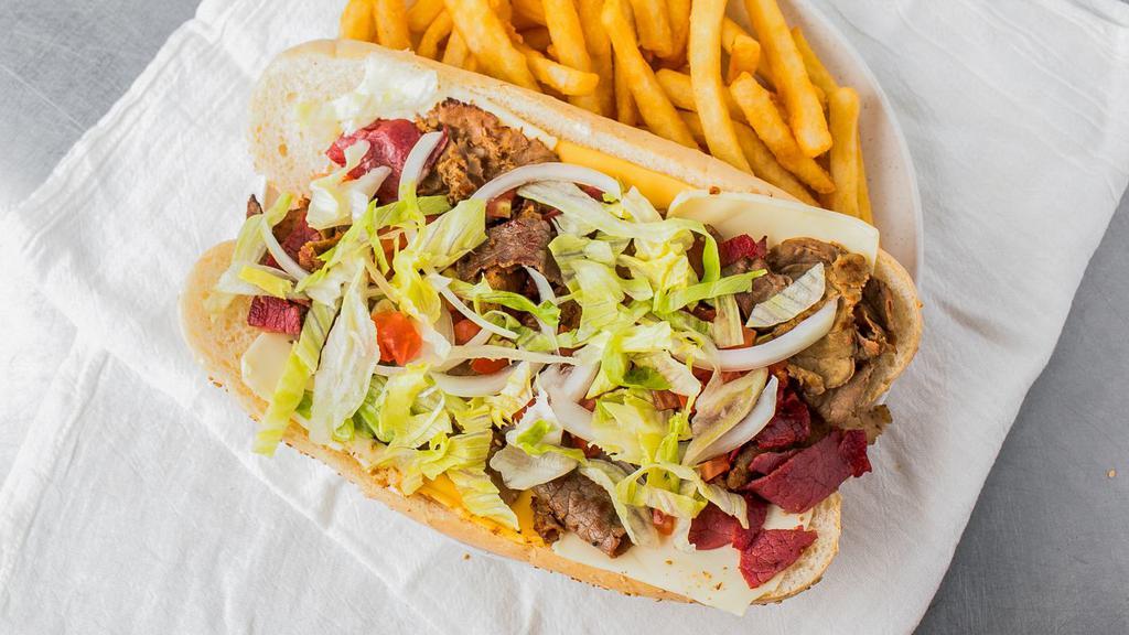 Gym Shoe Sandwich · Italian beef, gyro meat, slice of corned beef, Swiss cheese, lettuce, tomatoes, onions and mayo.
