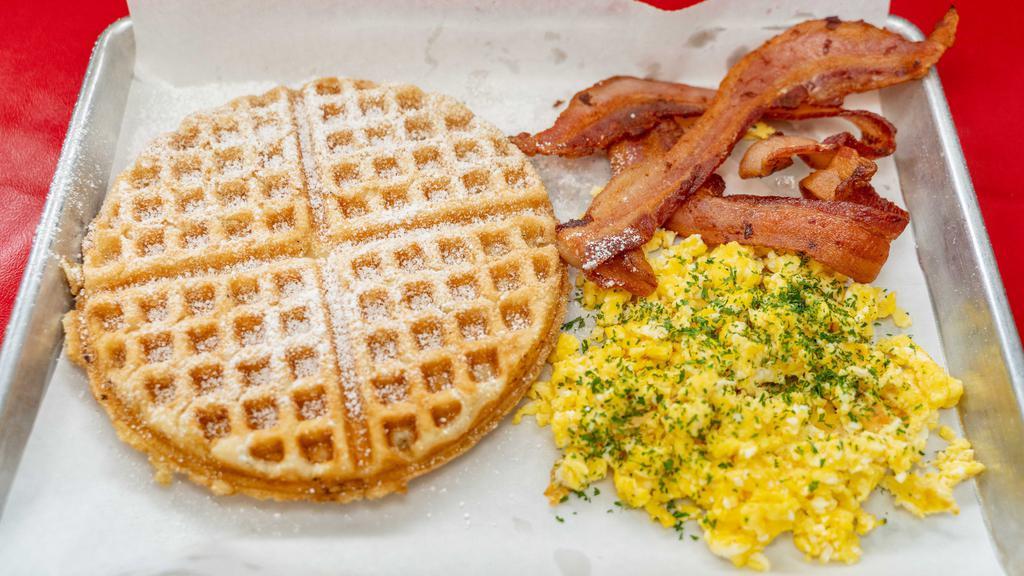 The Regular · Waffle, eggs, and your choice of bacon or sausage.