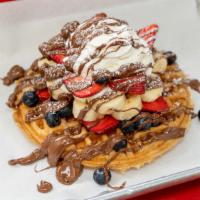 Nutella Waffle · Waffle topped with your choice of two fruits and whipped cream.