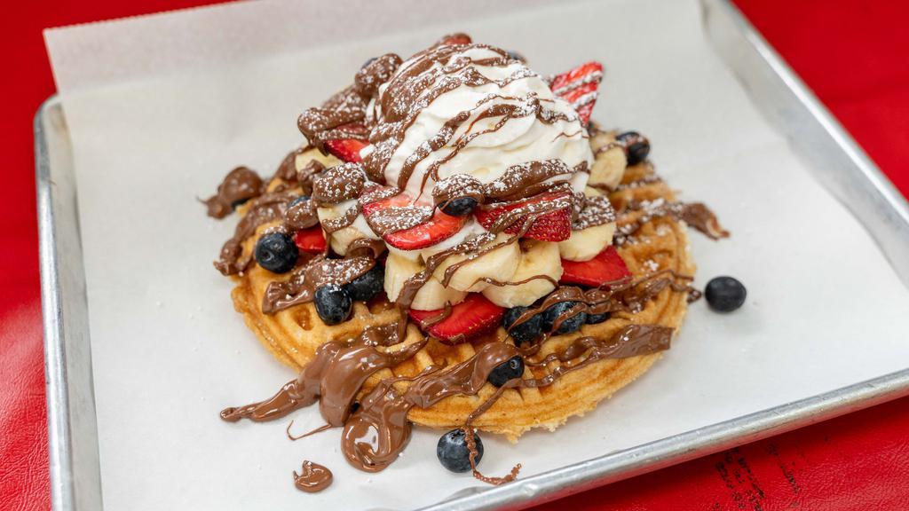 Nutella Waffle · Waffle topped with your choice of two fruits and whipped cream.