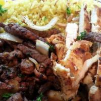 Mix Shawarma Plate (Lunch) · Meat and chicken shawarma served with rice and soup or salad
