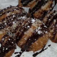 Fried Oreos · 6pc  fried oreos with chocolate syrup and powdered sugar!