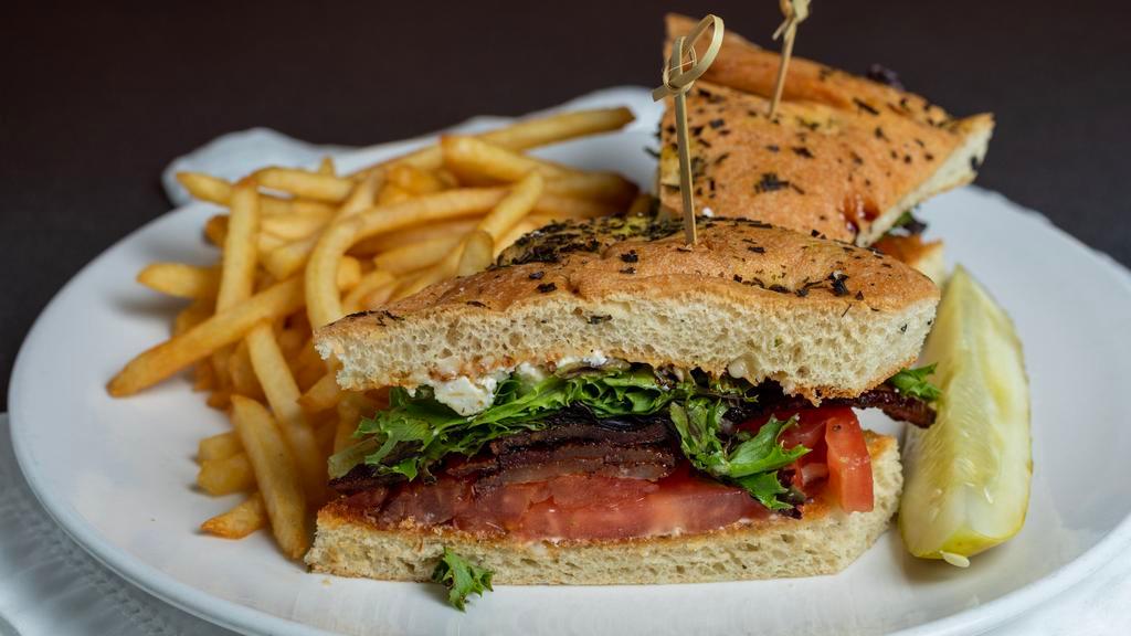 Blt · Brown sugar peppered bacon, balsamic glazed tomato, mixed greens, and feta cheese on grilled focaccia with garlic mayonnaise.