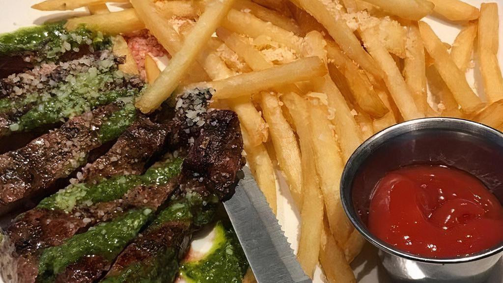 Steak Frites · Grilled flat iron steak with gremolata and parmesan fries.