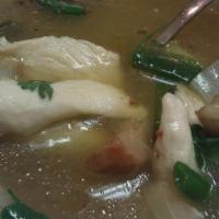 Tom Yum · Recommended soup with a touch of spice and a taste of Thai herbs. Cooked with mushroom, lemo...