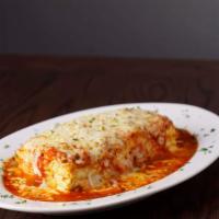 Baked Lasagna · Baked ribbon noodles, four-cheese blend marinara sauce.