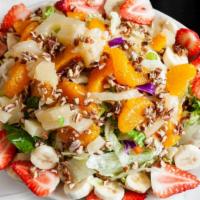Chicken Fruit Salad · Chicken with lettuce, strawberries, mandarin oranges, pineapples, bananas and walnuts with r...