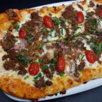 Beef Cilantro Pizza · stir-fried Beef tenderloin, onions, peppers, tomatoes, mozzarella provolone cheese, and cila...