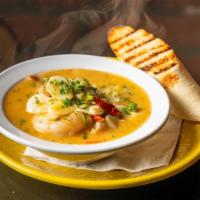 Shrimp And Garlic · Sautéed with fresh garlic, chilies, sherry wine, parsley, and grilled baguette