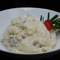 Mashed Potatoes · Red skin potatoes with butter, garlic and cream.