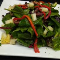 House Salad · Field greens, Manchego cheese, artichokes, roasted red peppers, caramelized pecans & balsami...