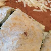Quesadilla Appetizer · 3 Quesadillas with Mozzarella and choice of meat and side of sour cream and guacamole