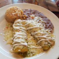 Enchiladas Verdes Beef · This enchilada dinner is smothered with a green tomatillo sauce and topped with melted cheese.