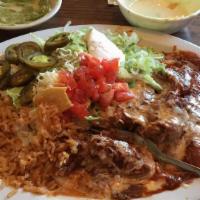 Enchiladas Rancheros Beef · We topped this enchilada with a ranchero sauce and melted cheese.