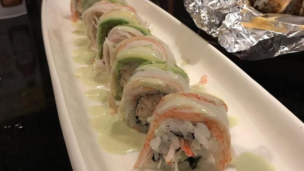 Alaskan Roll · Snow crab, cream cheese, top with eel, avo, with eel sauce and spicy mayo sauce.