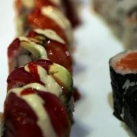 Ocean Roll · Shrimp, top with salmon, tuna, avocado, wasabi mayo, eel sauce, and hot sauce.
