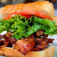 Blt · Two toasted pieces of texas toast with Mayo, Lettuce, Tomato, and 8 strips of delicious bacon.