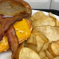 Chicken Bacon Cheddar · A juicy, grilled chicken breast topped with cheddar cheese, crisp bacon, lettuce, tomato, on...