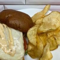 Chipotle Chicken Sandwich · Juicy, grilled chicken breast topped with melted provolone cheese, lettuce, tomato, onion an...