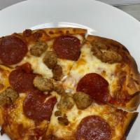 Pepperoni & Sausage Flatbread · Personal size pizza made with our housemade red sauce, sausage, pepperoni on top of a specia...