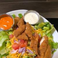 Buffalo Chicken Salad · Warm, breaded chicken, cheddar cheese, tomato and onion on a bed of chopped romaine. Served ...