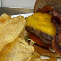 Bacon Cheddar Burger · A juicy 1/3lb burger topped with melted cheddar cheese and crispy bacon, topped with lettuce...