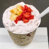 Strawberry Cheesecake · Strawberries and cheesecake pieces blended with vanilla ice cream or custard.