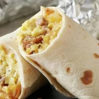 Build Your Own Breakfast Burrito · Choice of ingredients, breakfast potatoes wrapped in a warm flour tortilla.