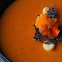 Tomato Soup · Touch of cream and slightly spiced.