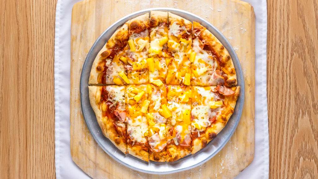 12″ Hawaiian · Our Quad City Style Hawaiian Pizza comes loaded with premium smoked Canadian bacon, pineapple, cheddar and house blend Mozzarella cheese. Your choice of house red sauce or BBQ sauce.
