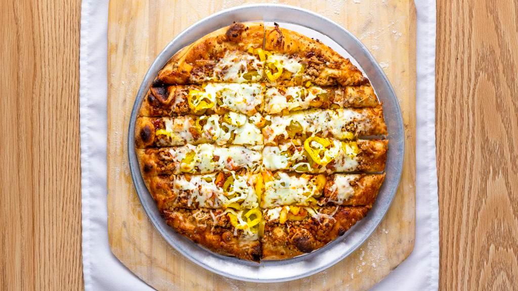 12″ Diablo · Spicy. BBQ sauce, QC style house crumbled sausage, banana peppers, onions, Jalapeños, spicy pepper jack cheese, house blend mozzarella with a dusting of XXX spices.