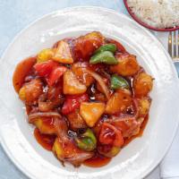 Sweet And Sour Chicken · Seasoned and battered in sweet and sour sauce, pineapples, red/green pepper, onion