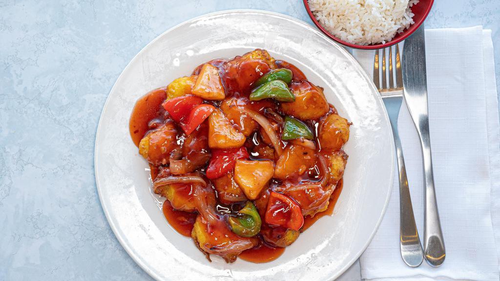 Sweet And Sour Chicken · Seasoned and battered in sweet and sour sauce, pineapples, red/green pepper, onion
