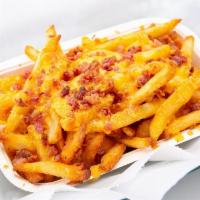 King Cheese Fries · Loaded fries smothered in cheddar,. topped w/ bacon bits & baked to a. golden brown (10-15 m...