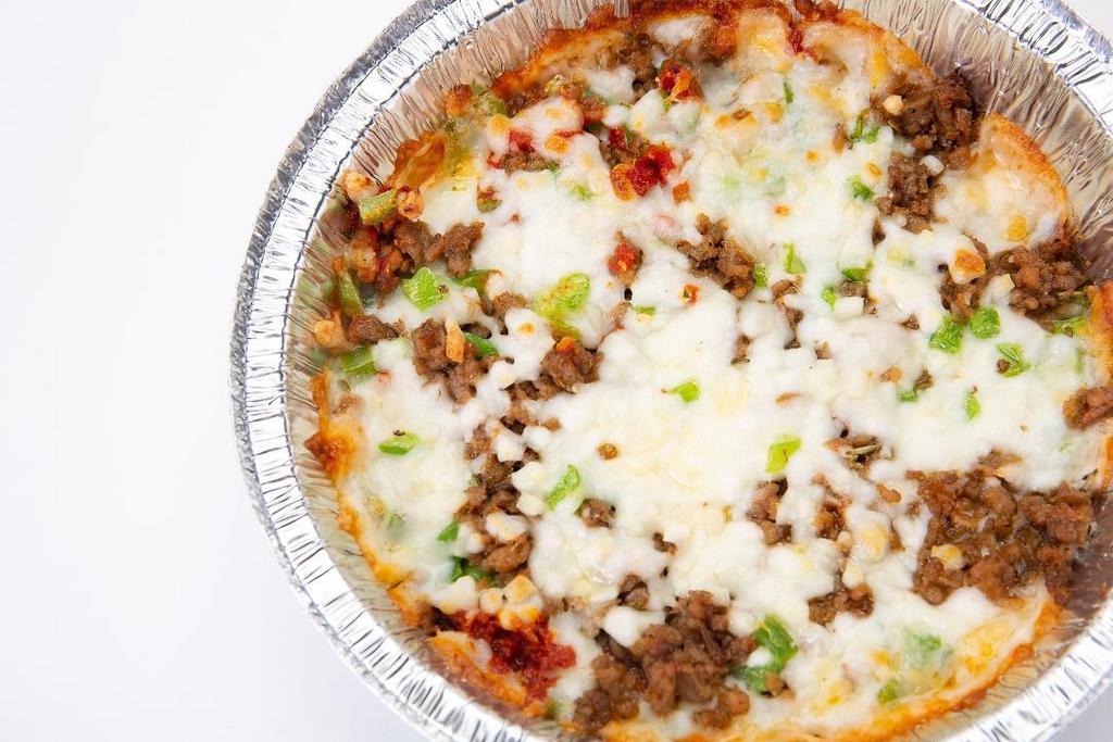 Crustless Pizza · Served in a foil pan. We add all your. favorites—tomato paste, cheese & add up to 3 additional toppings
