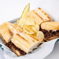 Philly Steak Subwich · Shredded beef, delicately blended spices, topped with melted mozzarella cheese, onions and f...