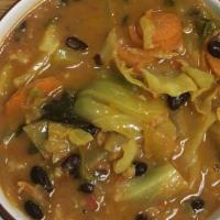 Vegetable Curry Soup · A hearty soup of black beans, brown/wild rice blend, and veggies with fresh, delightful curr...