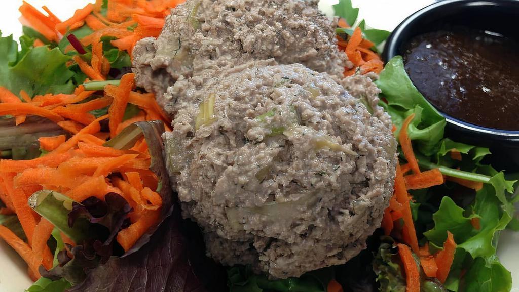 Notuna Salad · Our delicious notuna served on a bed of greens topped with shredded carrots and red cabbage with your choice of dressing. CONTAINS nuts and soy