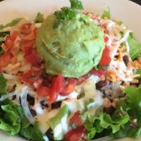Burrito Bowl · Black beans, brown rice, guacamole, lettuce, onion, salsa, house-made vegan sour cream, and ...