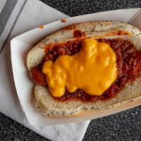 Chili Cheese Dog · Topped with chili and cheese.