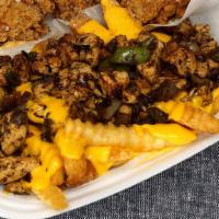 Jerk Chicken Cheese Fries  · Green peppers, onions , nacho cheese