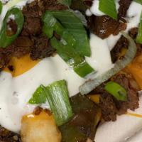 Jerk  Philly Cheesesteak Fries · Green peppers and onions & Nacho cheese